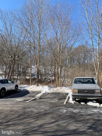 a view of a chairs and table on the deck