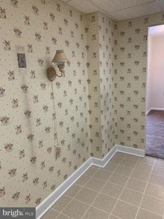 a bathroom with a sink and a stove