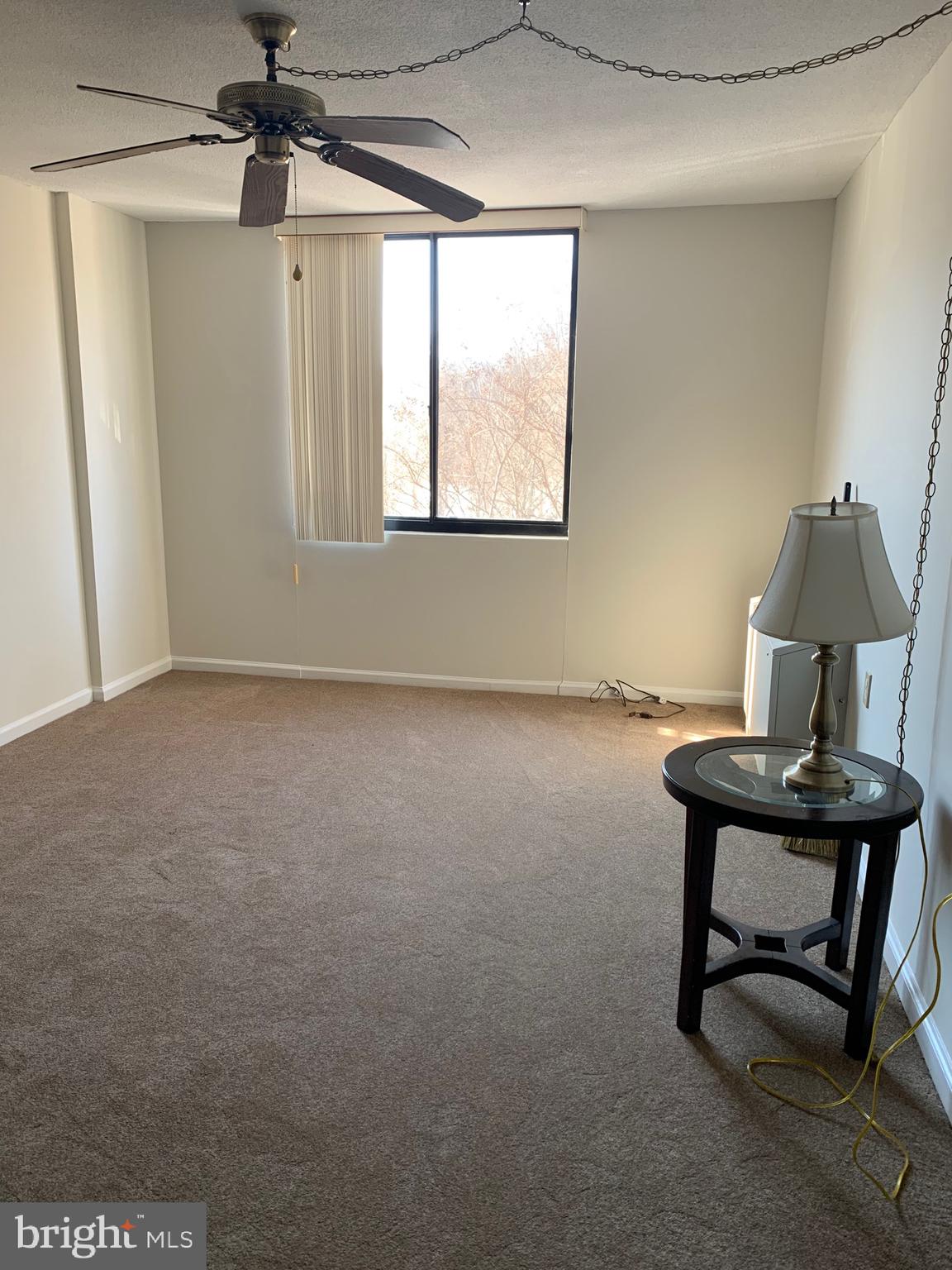 801 Yale Avenue, Unit 207 Swarthmore, PA 19081 - Photo 24 of 35 a view of a workspace with furniture and a window