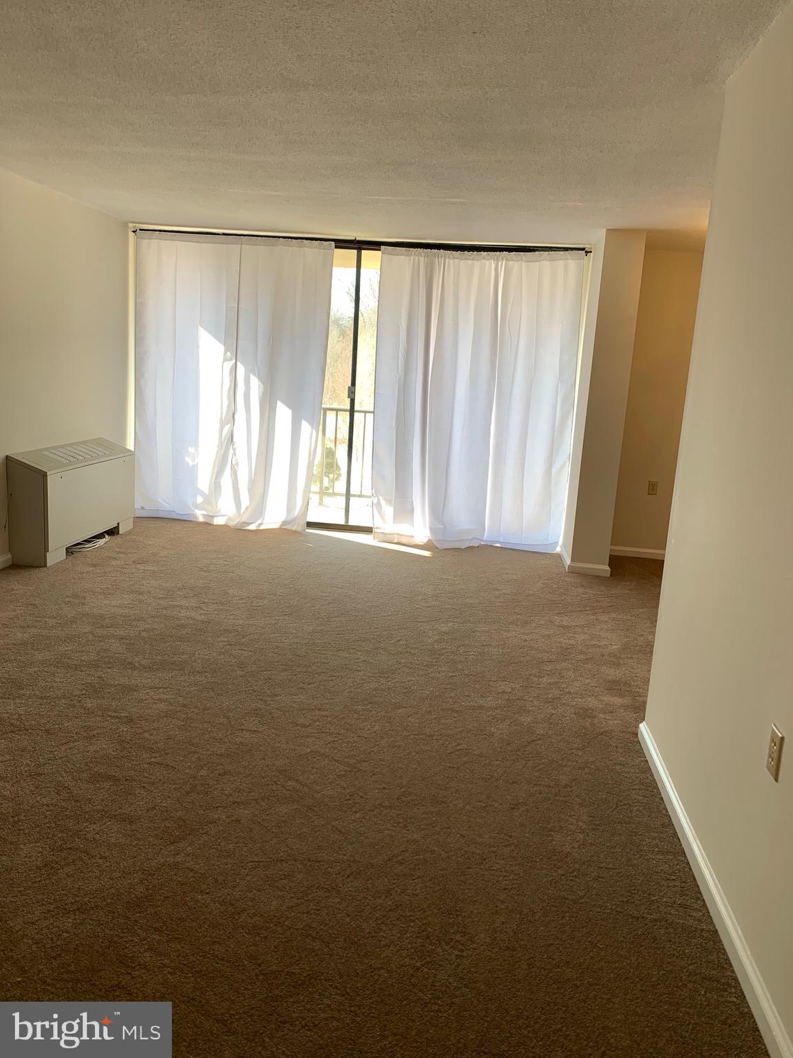 801 Yale Avenue, Unit 207 Swarthmore, PA 19081 - Photo 10 of 35 a view of an empty room with a window