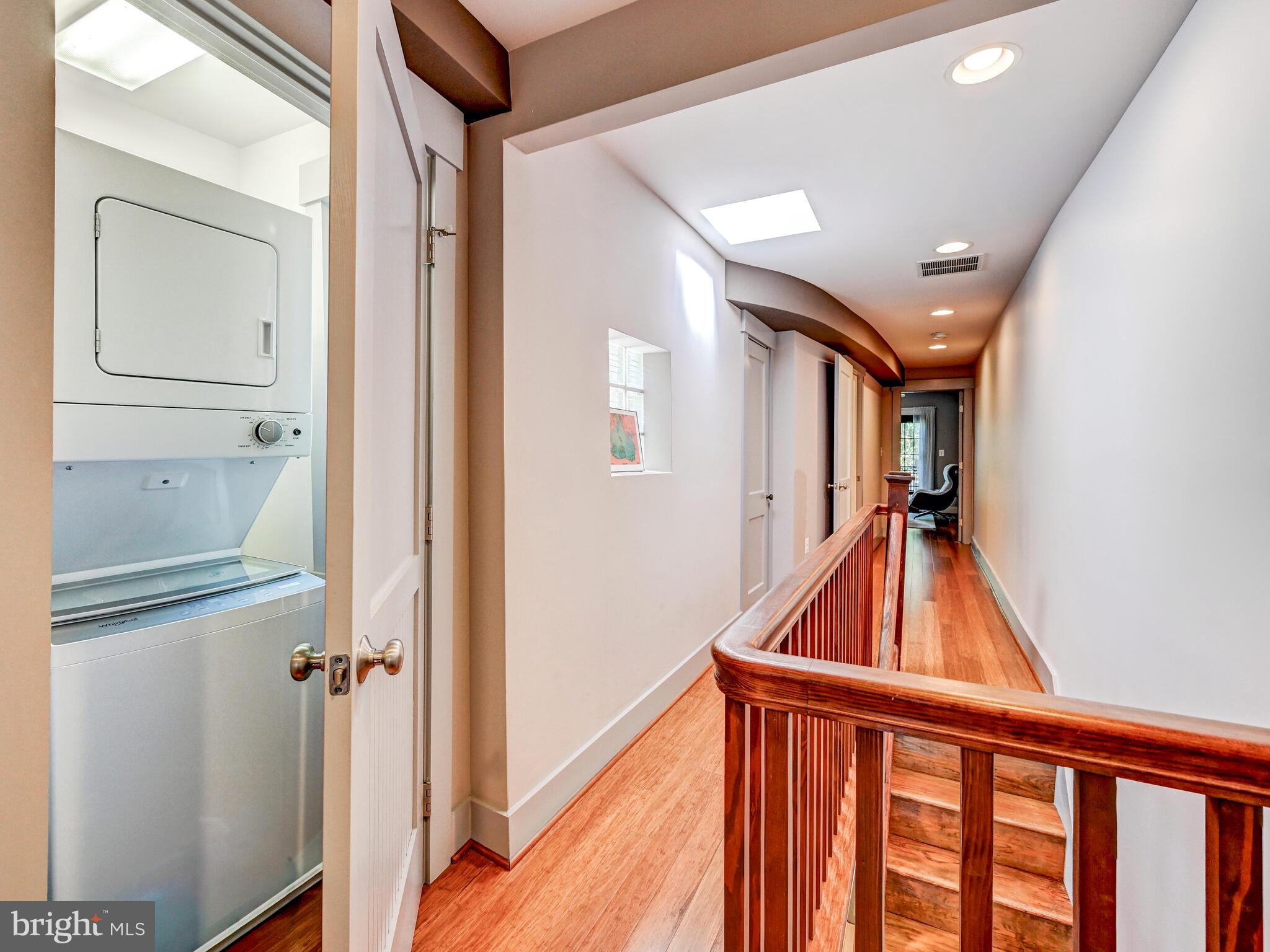325 South Castle Street Baltimore, MD 21231 - Photo 20 of 31 a view of a hallway with wooden floor and entryway