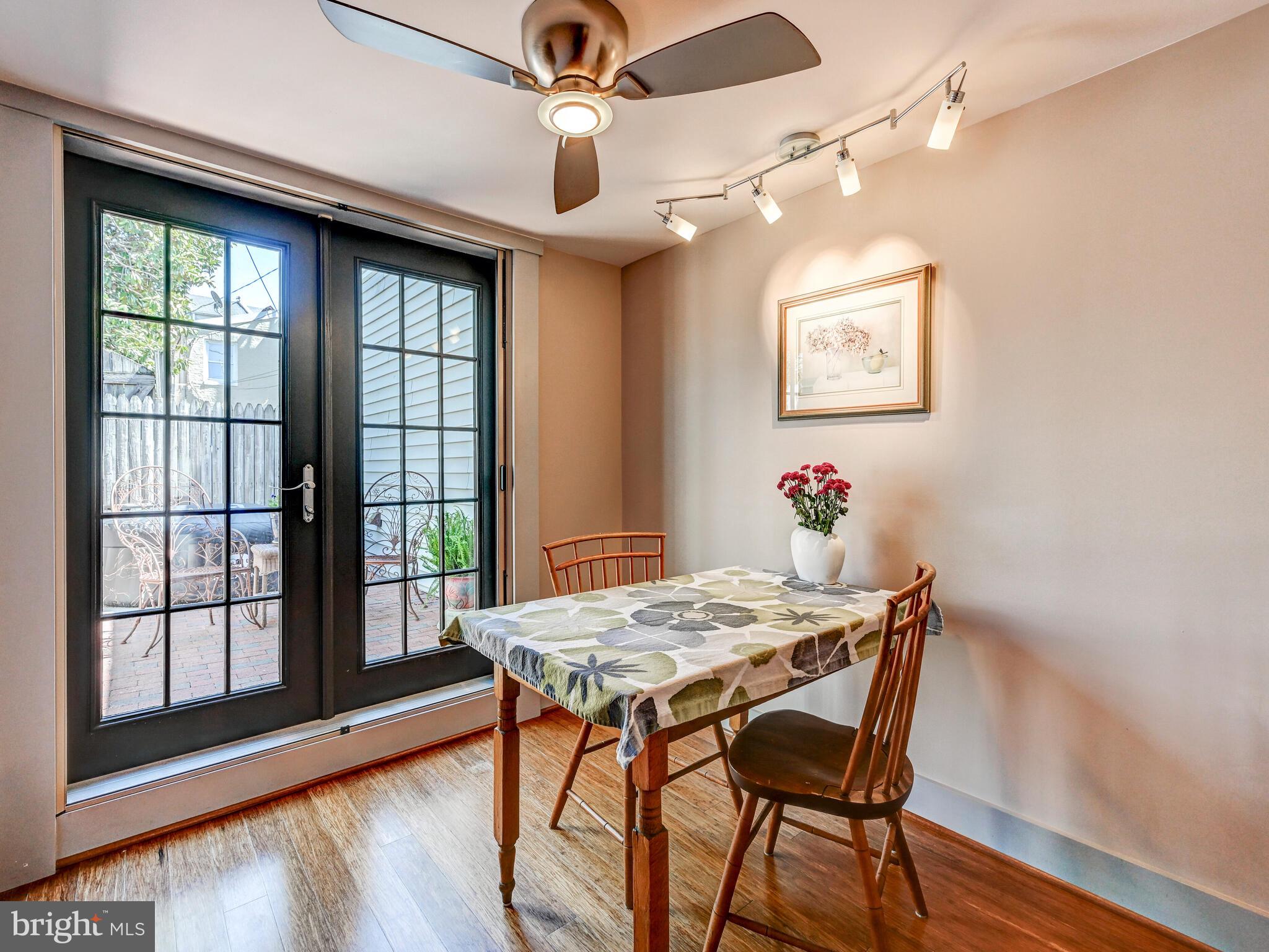 325 South Castle Street Baltimore, MD 21231 - Photo 9 of 31 a view of a dining room with furniture window and wooden floor