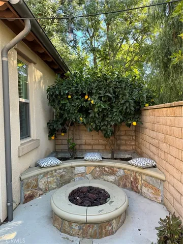 a backyard of house with outdoor seating