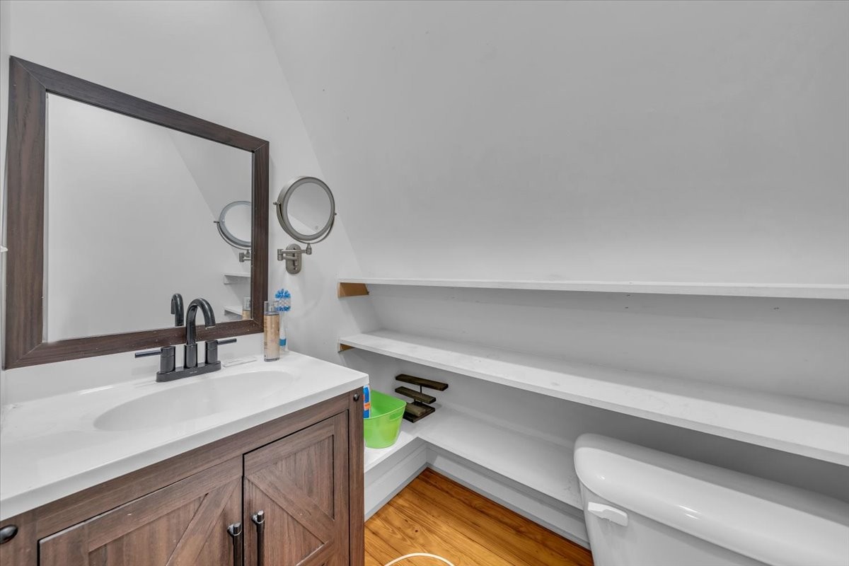 475 Lost Creek Road Lynchburg, TN 37352 - Photo 24 of 34 a bathroom with a sink and a mirror
