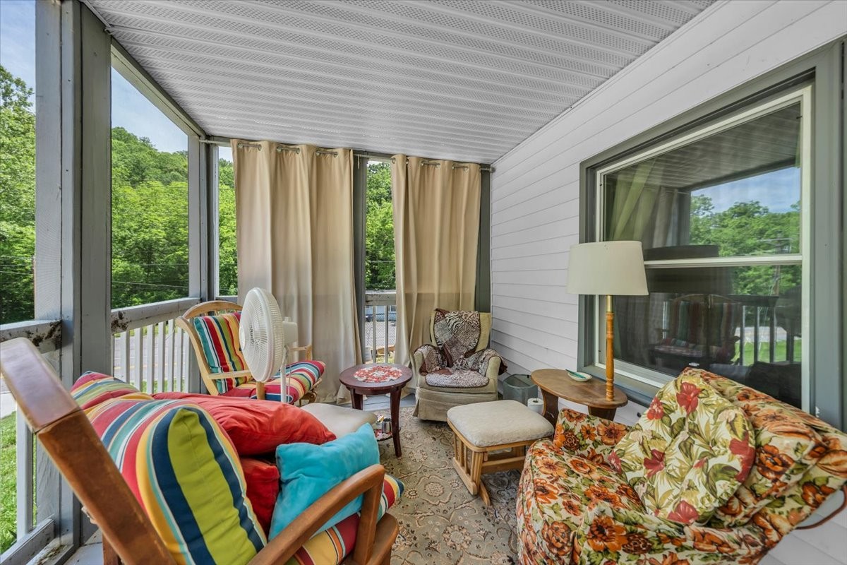 475 Lost Creek Road Lynchburg, TN 37352 - Photo 26 of 34 a balcony with furniture and a garden
