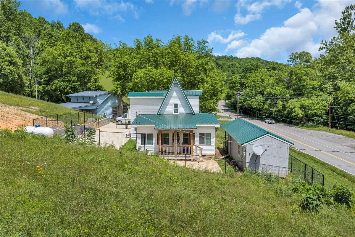 475 Lost Creek Road Lynchburg, TN 37352 - Photo 30 of 34 an aerial view of a house with a big yard