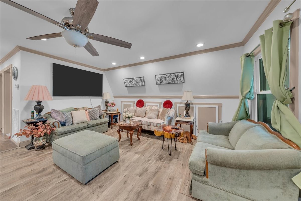 475 Lost Creek Road Lynchburg, TN 37352 - Photo 6 of 34 a living room with furniture and a flat screen tv