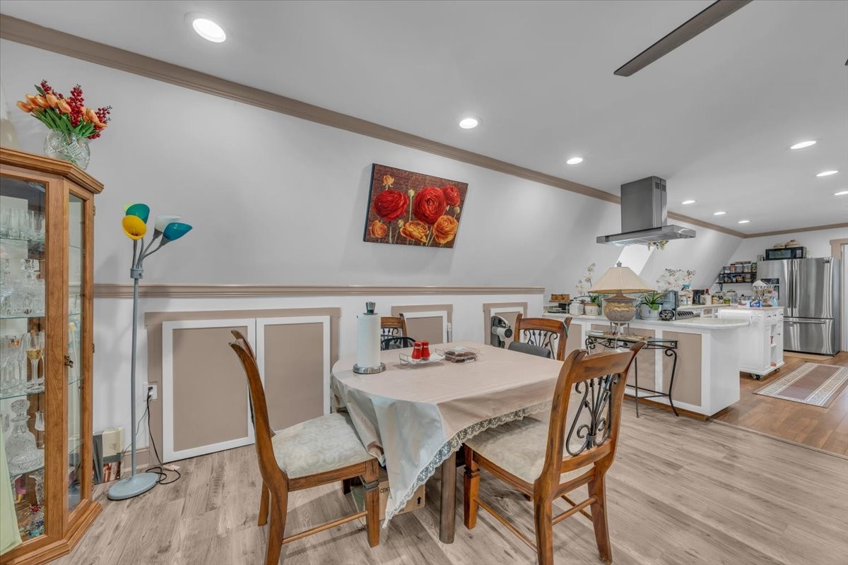 475 Lost Creek Road Lynchburg, TN 37352 - Photo 8 of 34 a dining room with furniture and wooden floor
