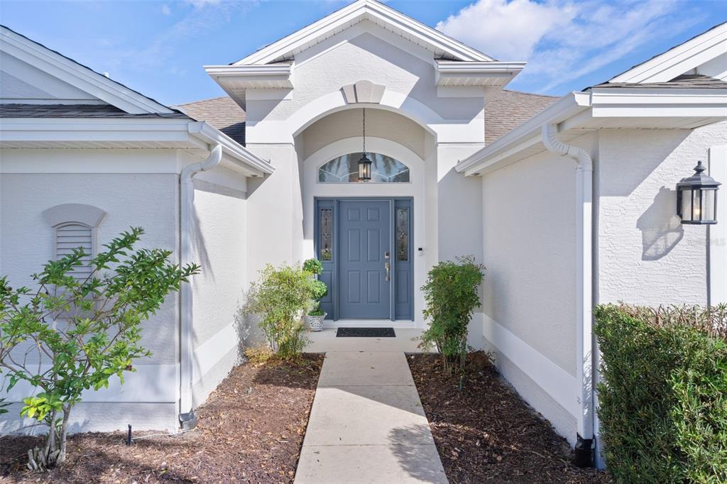 2211 Bachman Path The Villages, FL 32162 - Photo 2 of 60 a view of a house with a outdoor space
