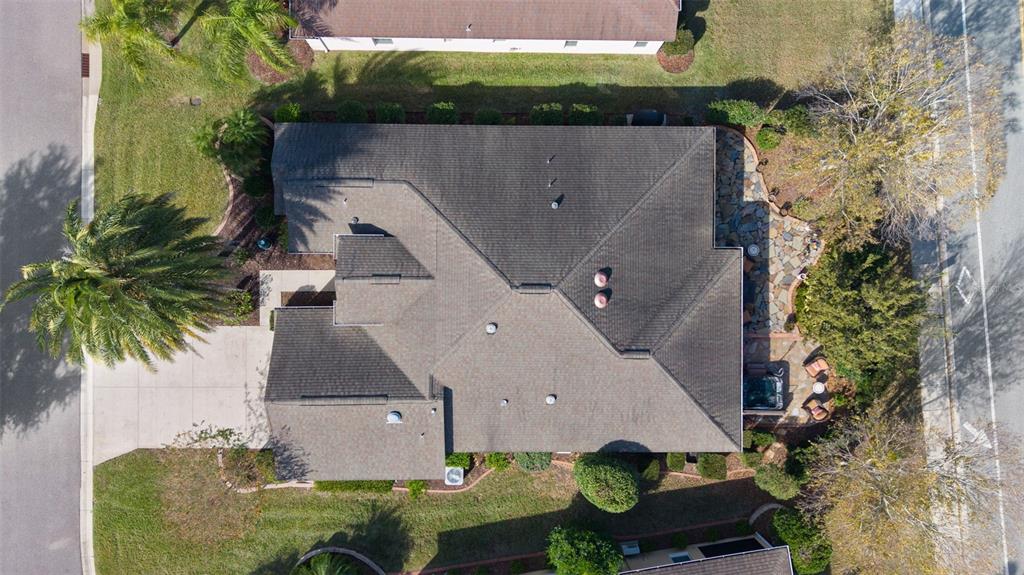 2211 Bachman Path The Villages, FL 32162 - Photo 53 of 60 an aerial view of a house with a yard and a large tree