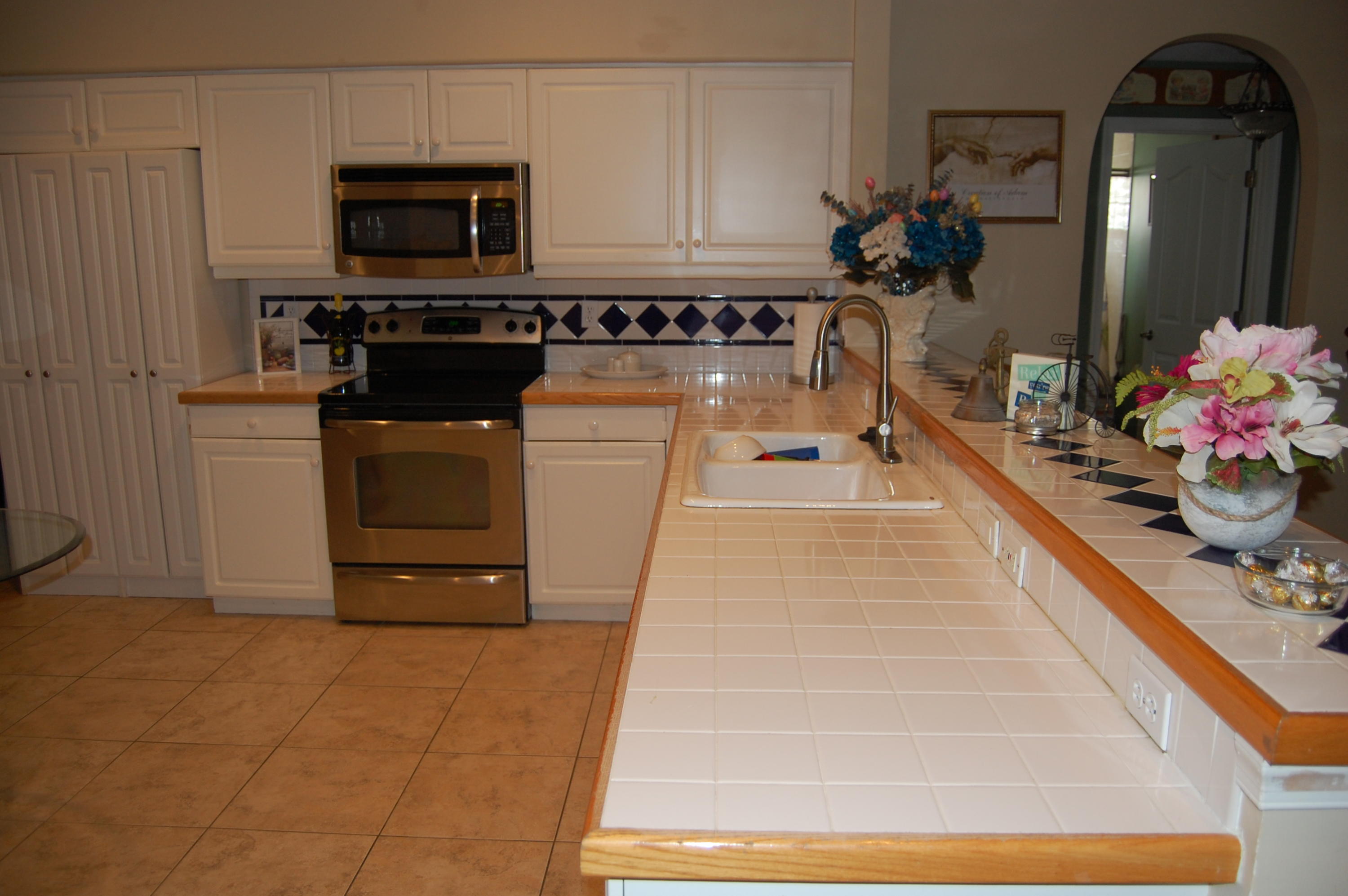 6261 Michael Street Jupiter, FL 33458 - Photo 8 of 16 PETERSON KITCHEN 4