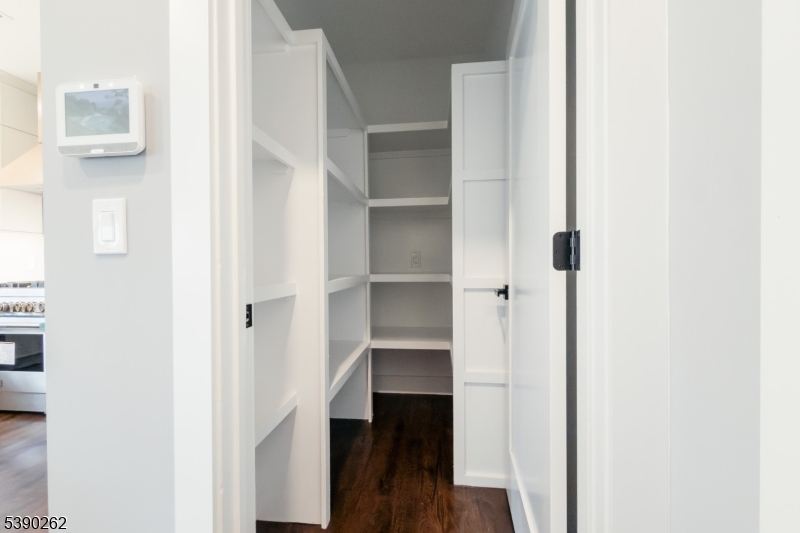 4 Hemlock Circle Warren, NJ 07059 - Photo 17 of 28 a view of walk in closet with empty racks