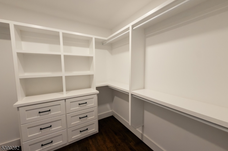 4 Hemlock Circle Warren, NJ 07059 - Photo 25 of 28 a hallway with cabinets