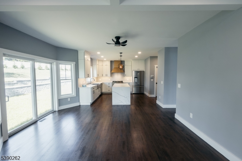 4 Hemlock Circle Warren, NJ 07059 - Photo 10 of 28 a view of a kitchen with wooden floor and a window
