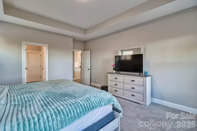 a white bath tub sitting next to a window