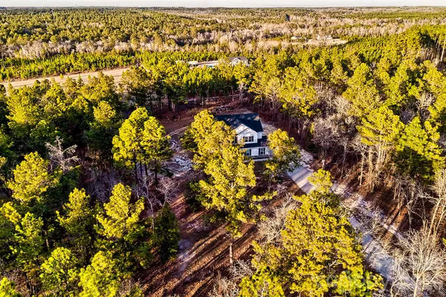 a view of a room that has a window in it