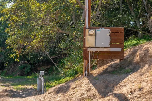a view of a sink and table in the backyard