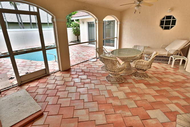 6829 Sun River Road Boynton Beach, FL 33437 - Photo 30 of 48 Covered patio & screen enclosure