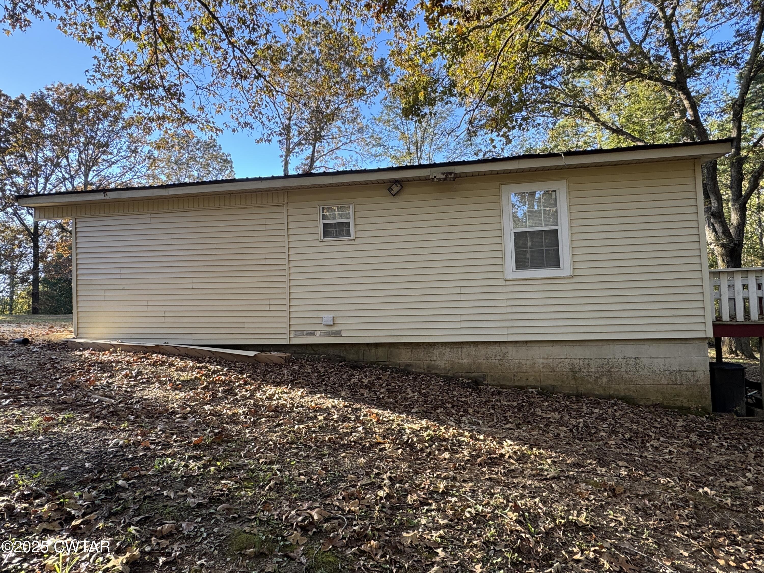 380 Patterson Lane Finger, TN 38334 - Photo 5 of 25 a side view of a house