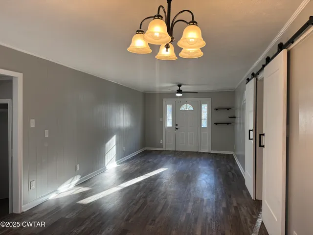 a view of a livingroom with wooden floor