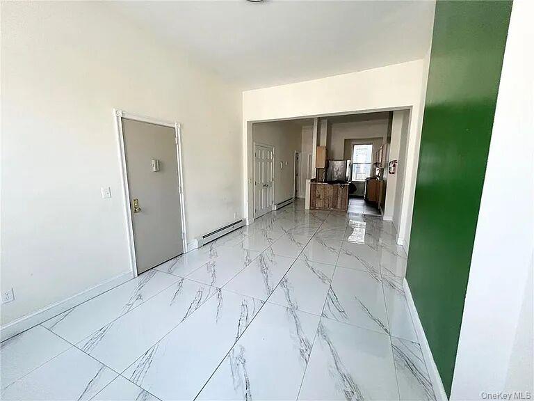 296 Mill Street Poughkeepsie, NY 12601 - Photo 3 of 19 a view of a bedroom from a hallway