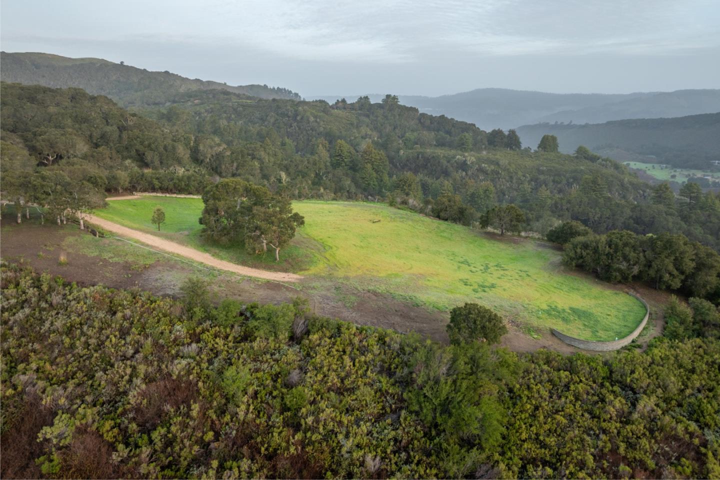 17 Rancho San Carlos Road Carmel, CA 93923 - Photo 12 of 24 a view of a lake with a mountain in the background