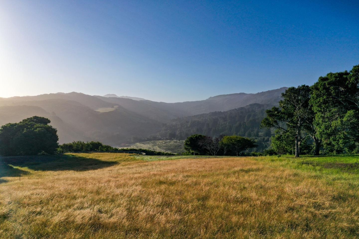 17 Rancho San Carlos Road Carmel, CA 93923 - Photo 4 of 24 a view of a lake with mountains in the background