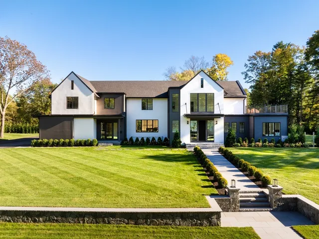 a view of a house with swimming pool