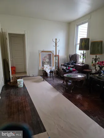 a room with a chair and a window