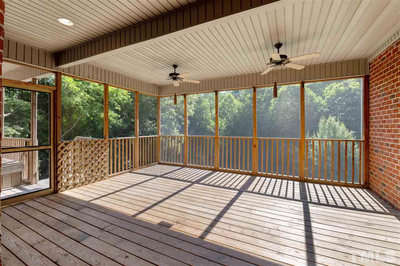 12804 Summerwind Trail Rougemont, NC 27572 - Photo 17 of 27 a view of a balcony with wooden floor
