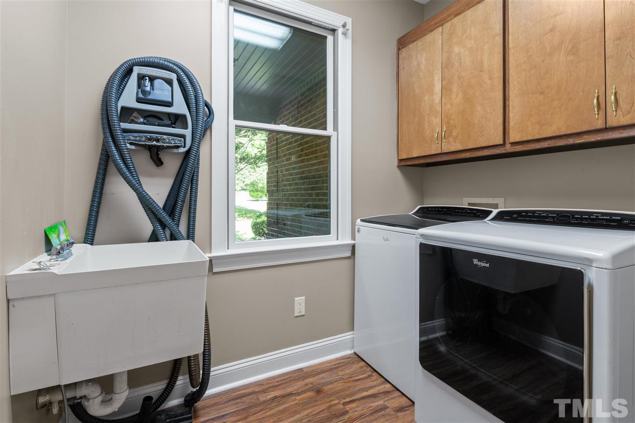 12804 Summerwind Trail Rougemont, NC 27572 - Photo 22 of 27 a view of kitchen with washer and dryer