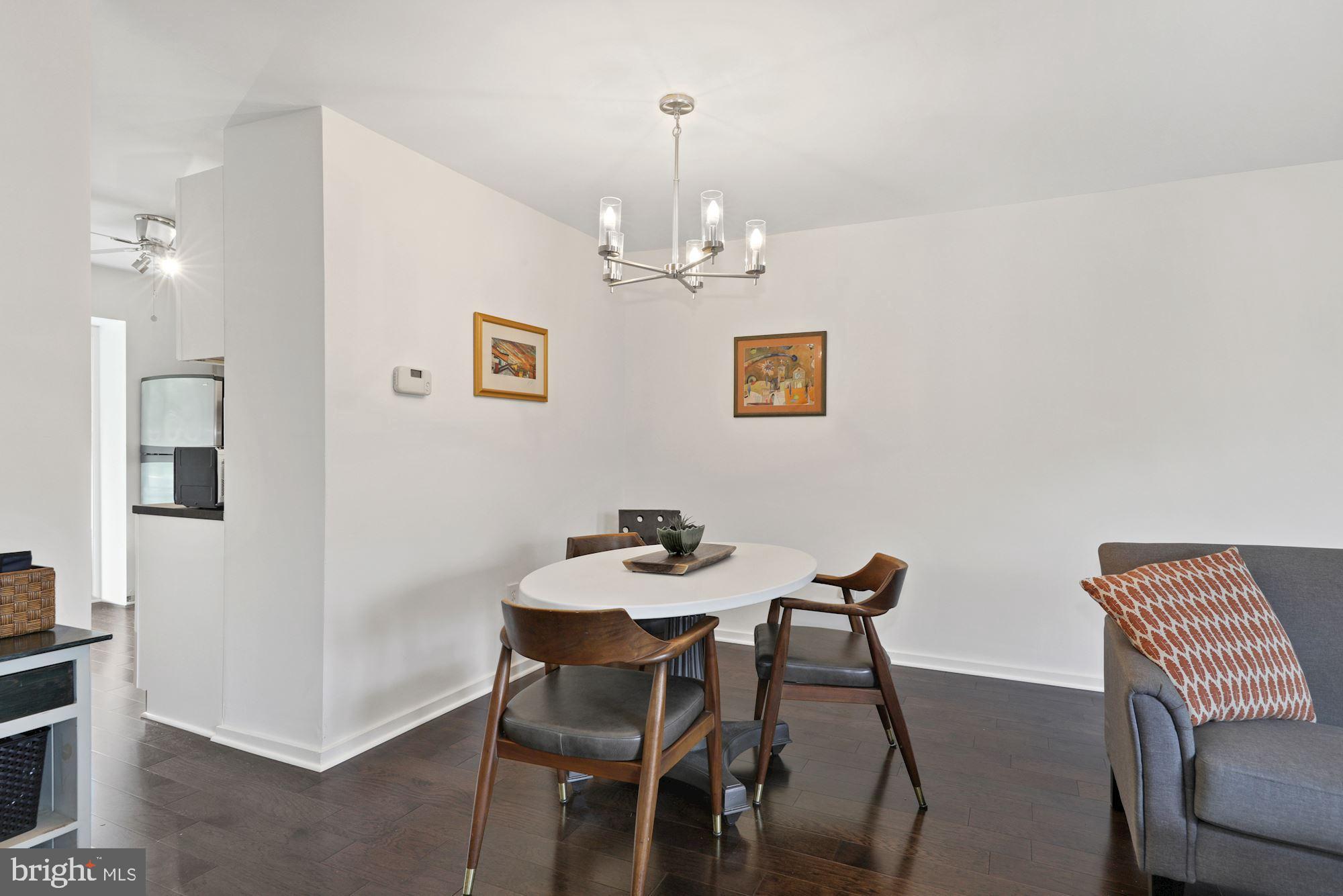 2425 Michigan Avenue Silver Spring, MD 20910 - Photo 11 of 30 Dining area with contemporary chandelier