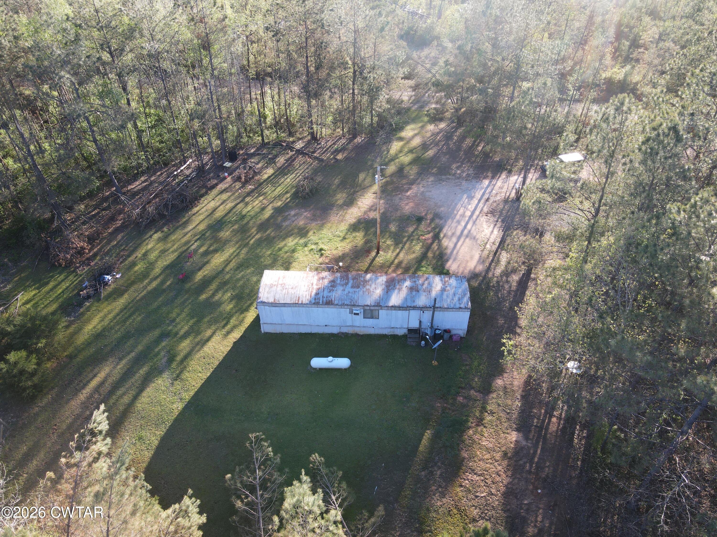 665 Ruth Lane Sardis, TN 38371 - Photo 1 of 14 dji_fly_20260406_180606_717_177551318252