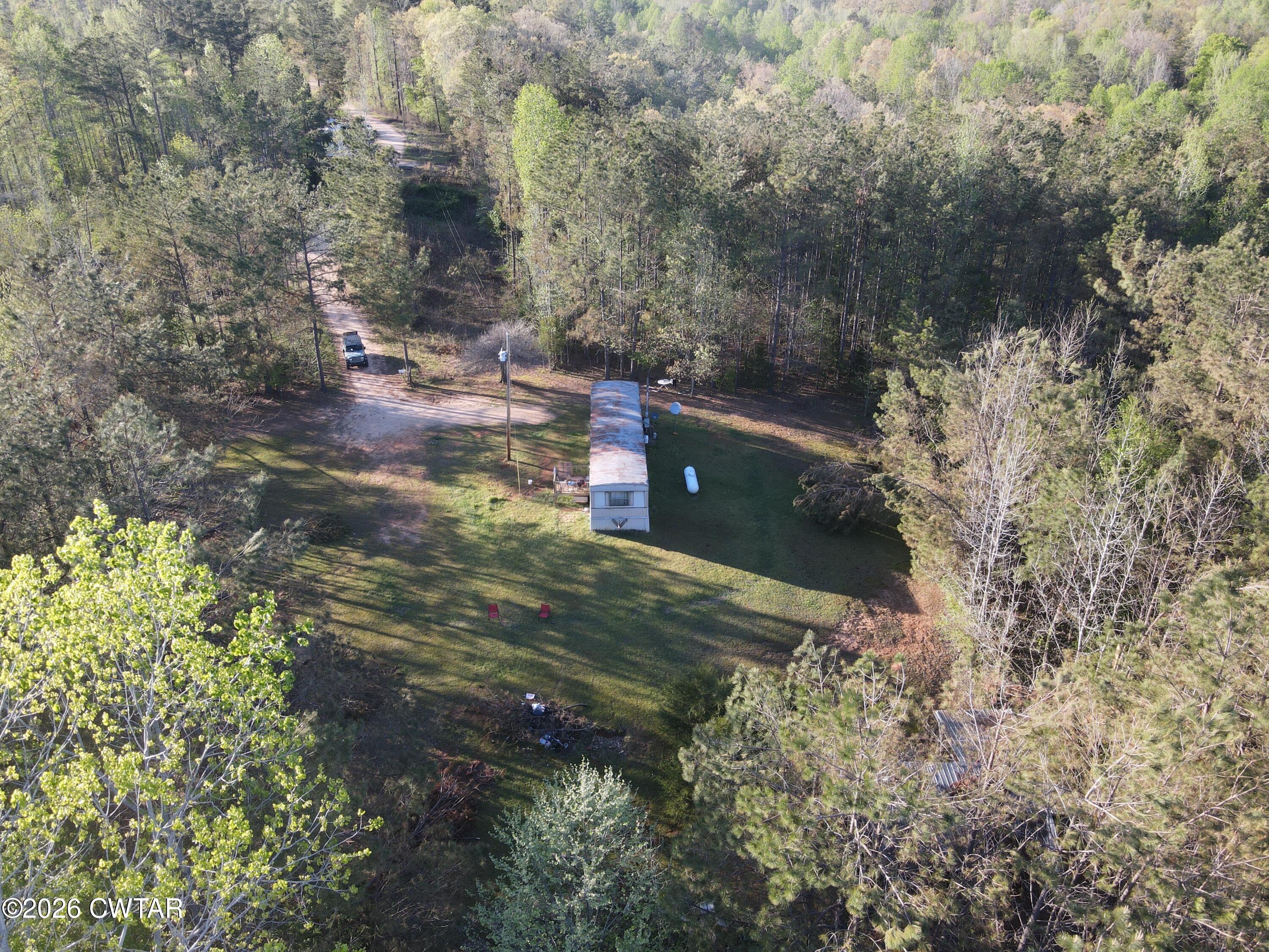 665 Ruth Lane Sardis, TN 38371 - Photo 2 of 14 dji_fly_20260406_180632_718_177551320635