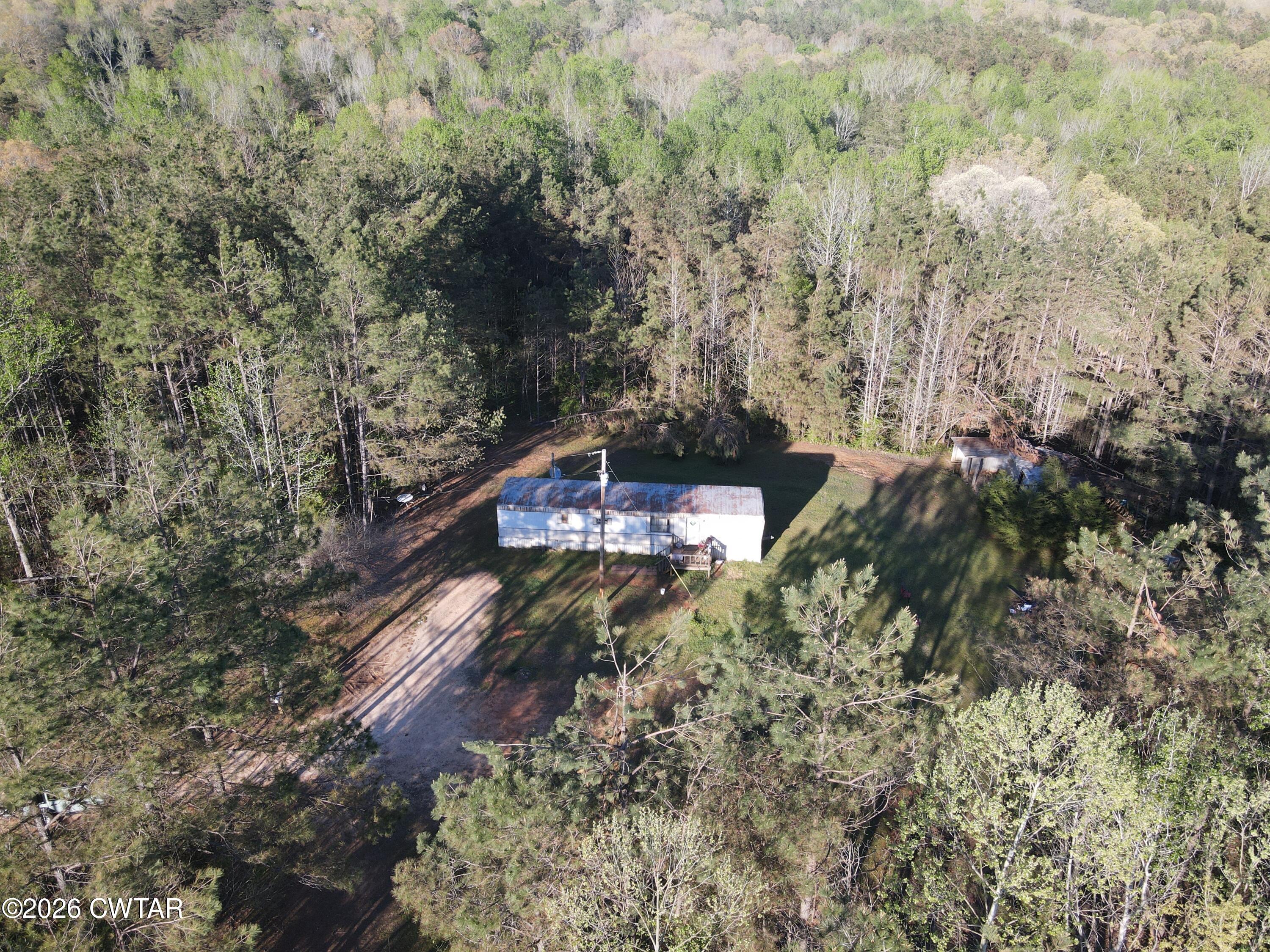 665 Ruth Lane Sardis, TN 38371 - Photo 3 of 14 dji_fly_20260406_180700_719_177551323477