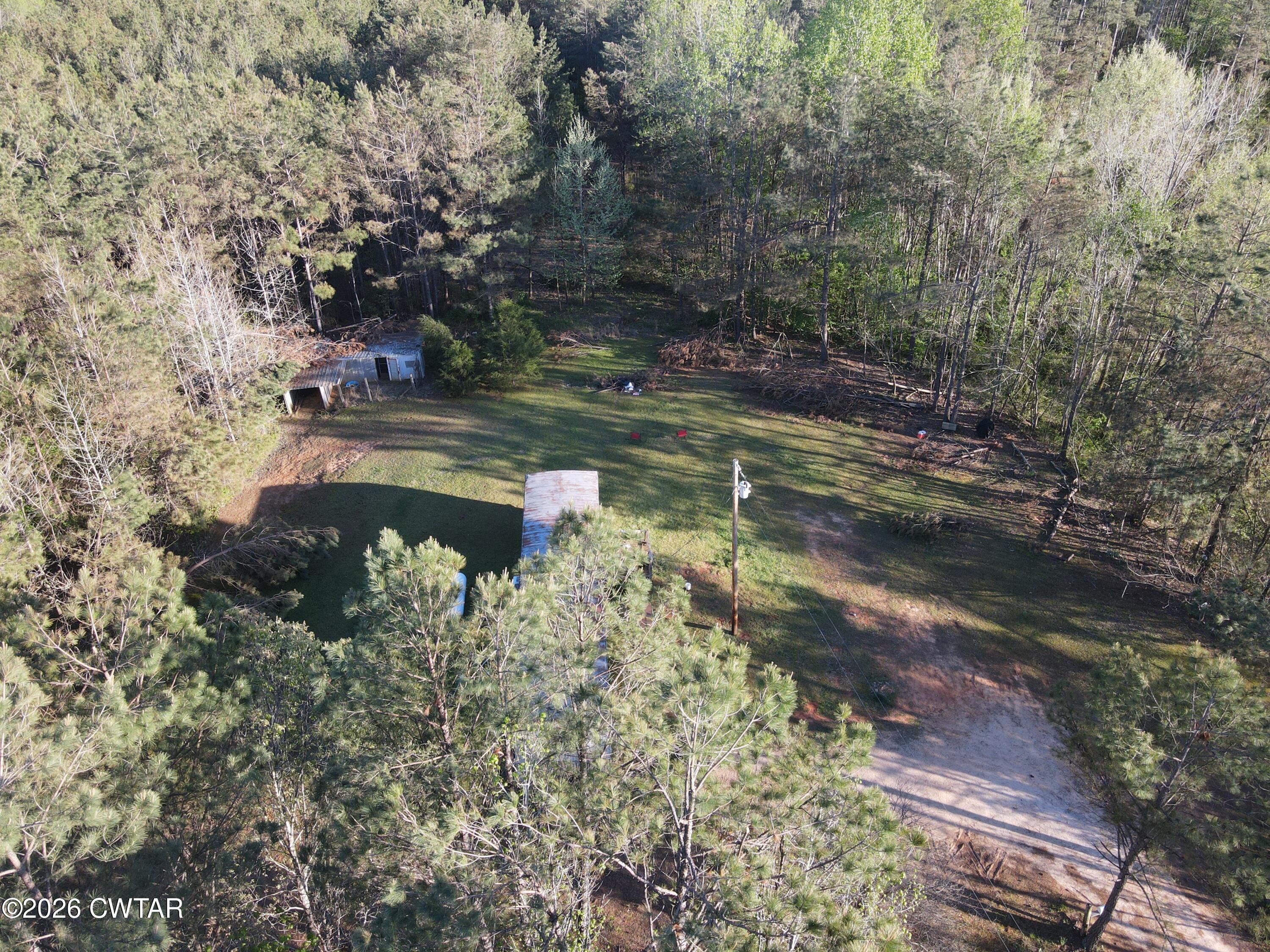 665 Ruth Lane Sardis, TN 38371 - Photo 6 of 14 dji_fly_20260406_180746_721_177551327956