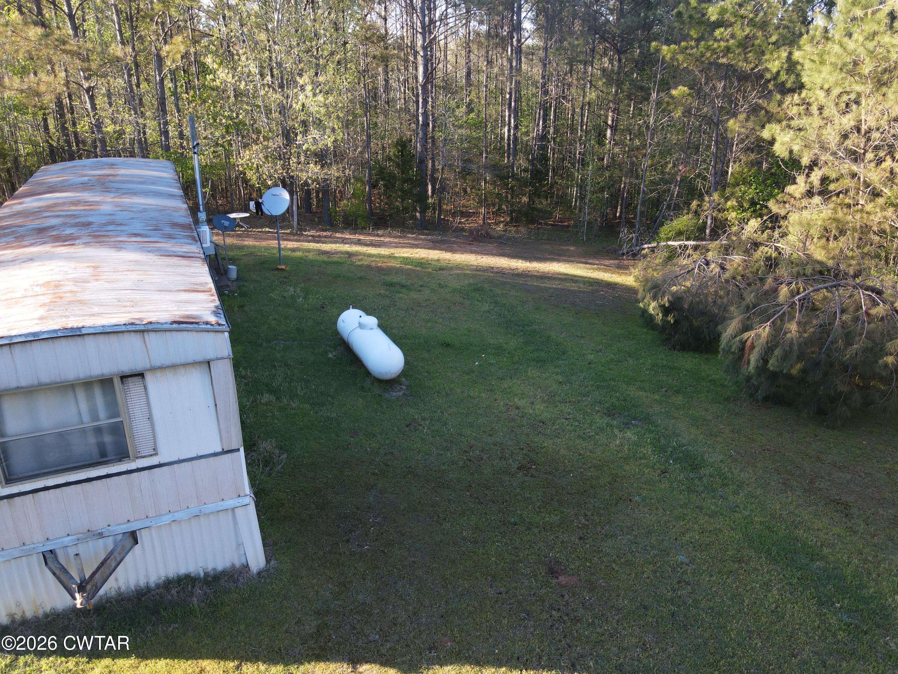 665 Ruth Lane Sardis, TN 38371 - Photo 8 of 14 dji_fly_20260406_181044_723_177551345701