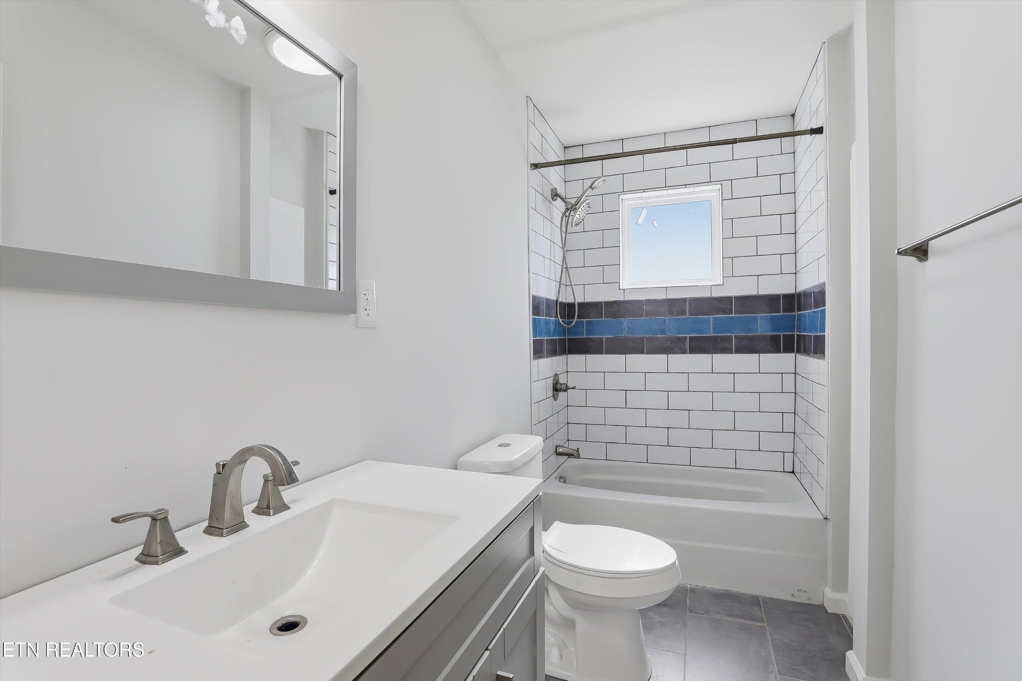 6120 Cline Road Knoxville, TN 37938 - Photo 12 of 29 a bathroom with a sink a toilet and shower