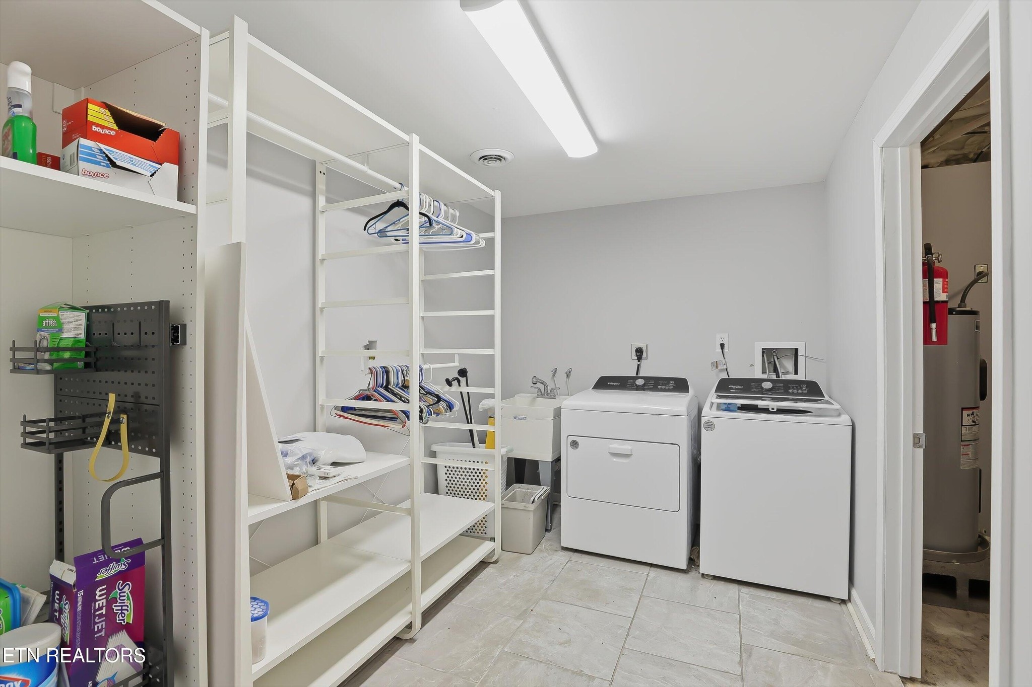 6120 Cline Road Knoxville, TN 37938 - Photo 23 of 29 a kitchen with a sink stove and cabinets