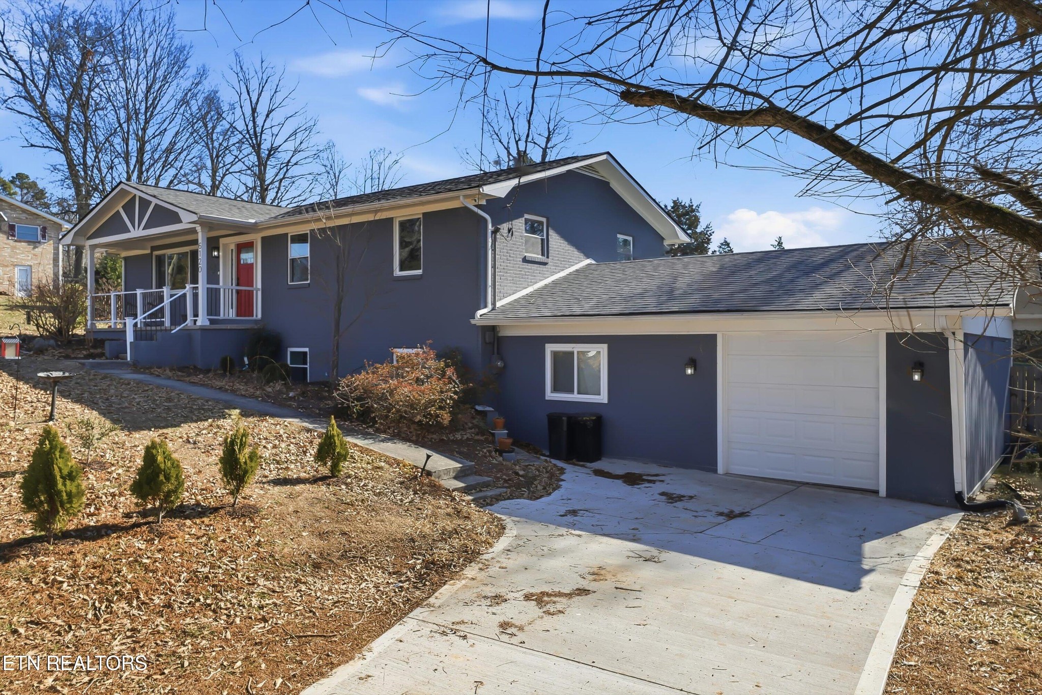 6120 Cline Road Knoxville, TN 37938 - Photo 3 of 29 a front view of a house with a yard