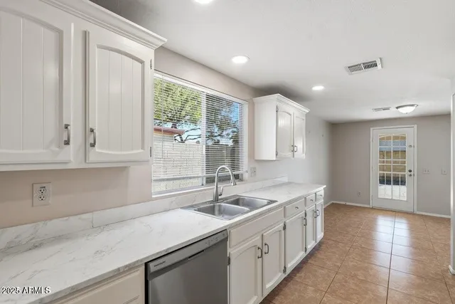 a bathroom with a toilet sink and bathtub
