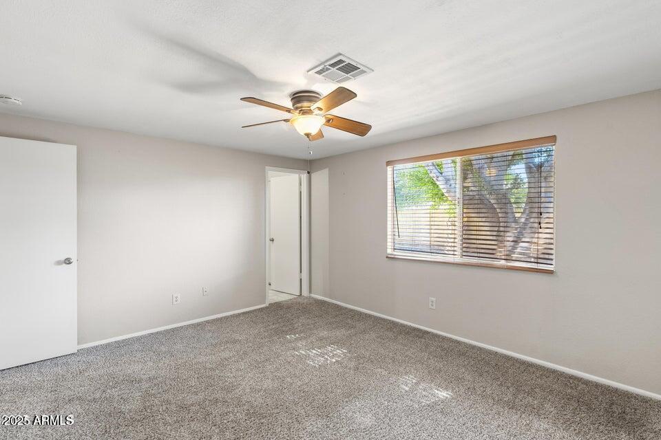 1525 West El Alba Way Chandler, AZ 85224 - Photo 24 of 33 a view of an empty room with a window