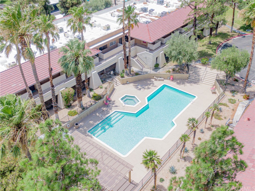 2875 North Los Felices Road, Unit 214 Palm Springs, CA 92262 - Photo 1 of 1 an aerial view of a house with garden space and street view