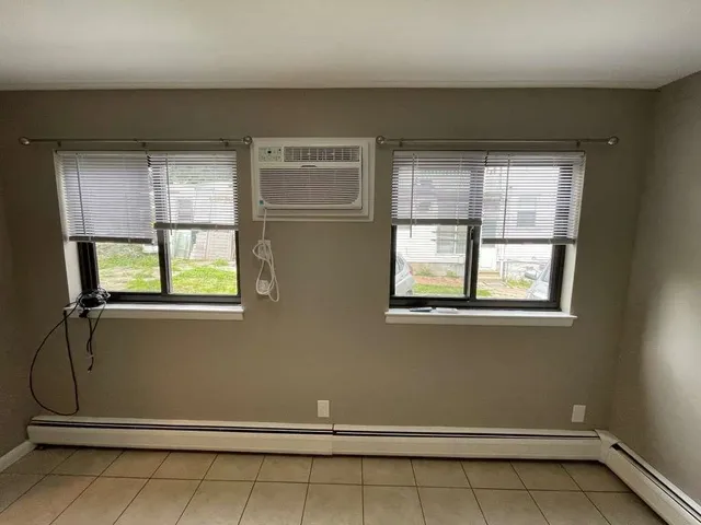 a view of a livingroom and entryway