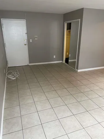 a hallway with a sink