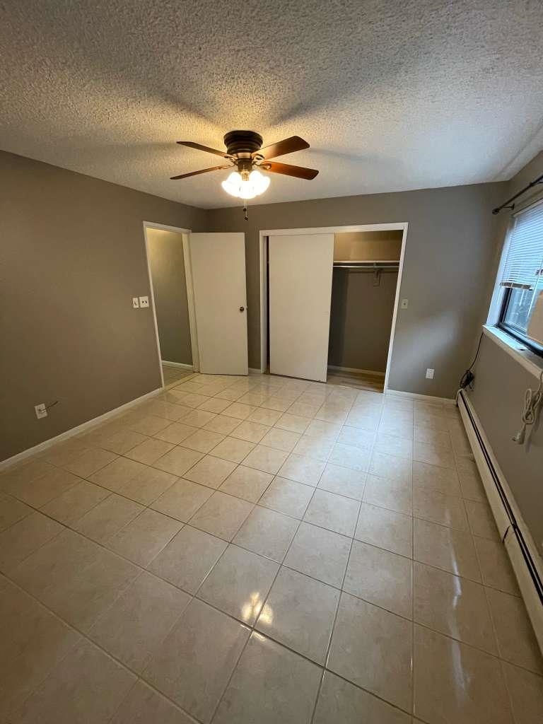 17 68th Street, Unit 7 Guttenberg, NJ 07093 - Photo 23 of 30 a view of an empty room with a window