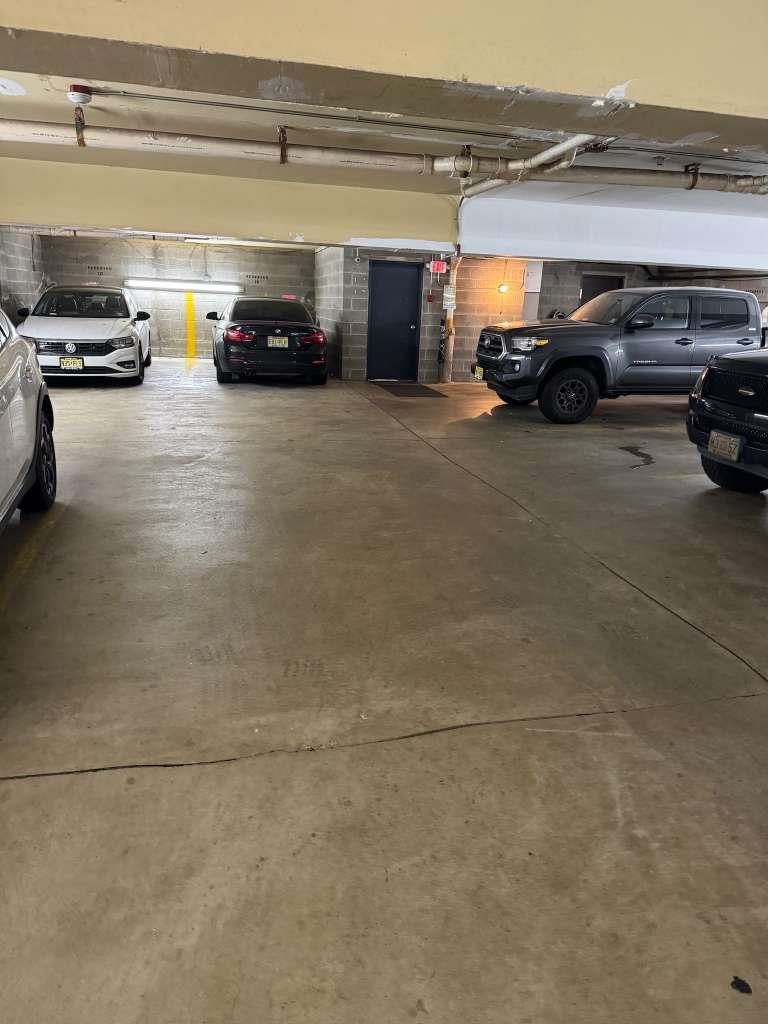 17 68th Street, Unit 7 Guttenberg, NJ 07093 - Photo 30 of 30 a view of parking garage with cars
