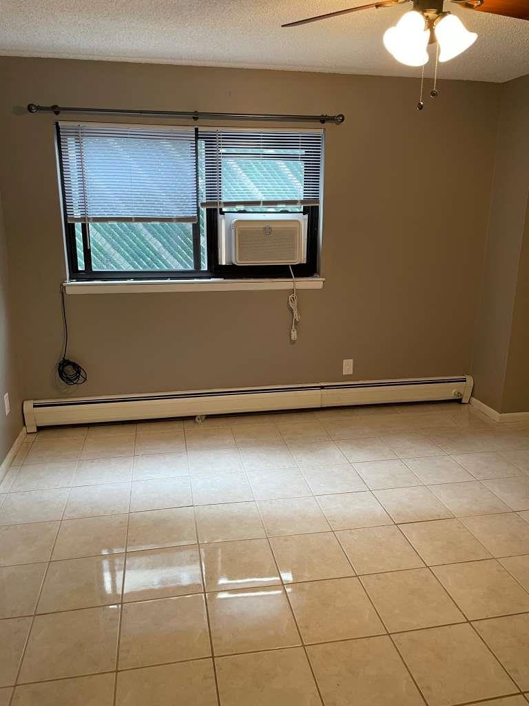 17 68th Street, Unit 7 Guttenberg, NJ 07093 - Photo 6 of 30 a view of room with window