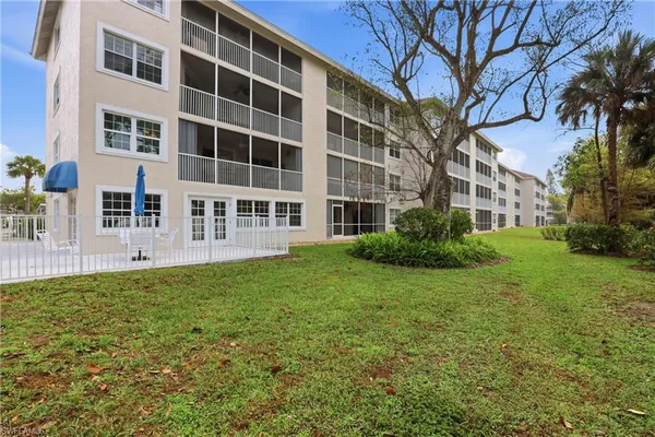 a view of building with yard