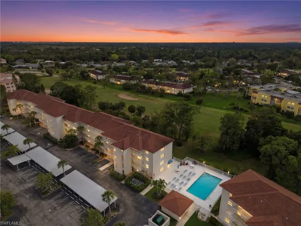 an aerial view of a house with a garden